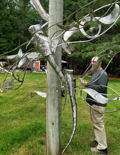 Unique patina and stainless metal and concrete sculptures by John Czegledi Inventor and Designer Courtenay BC